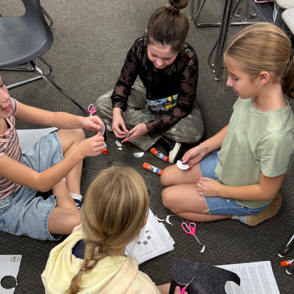 Students with their moon phase models.