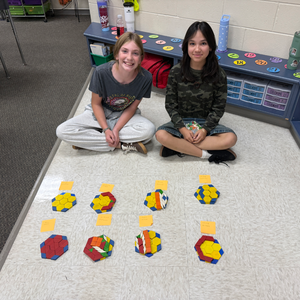 Students with their moon phase models.