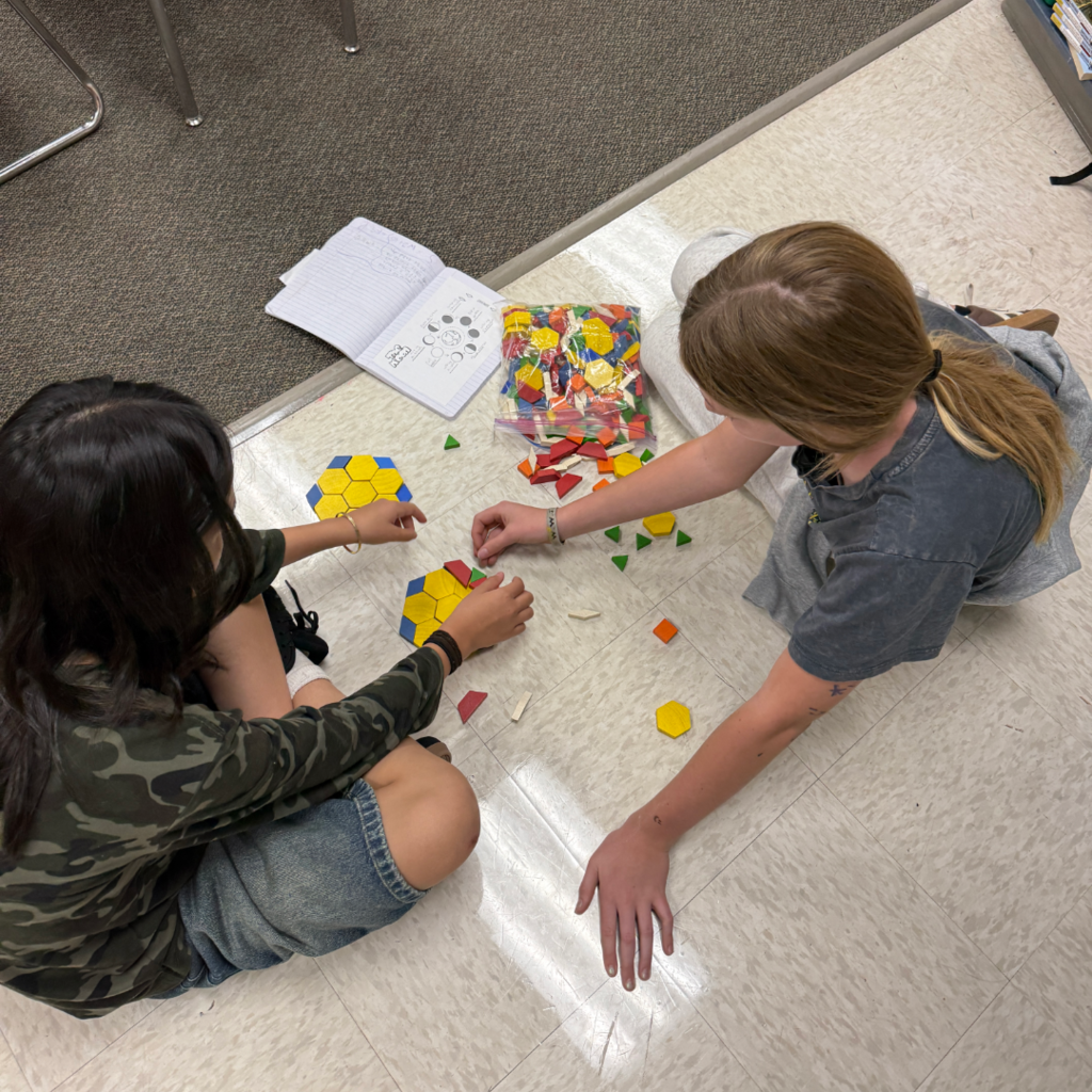 Students with their moon phase models.