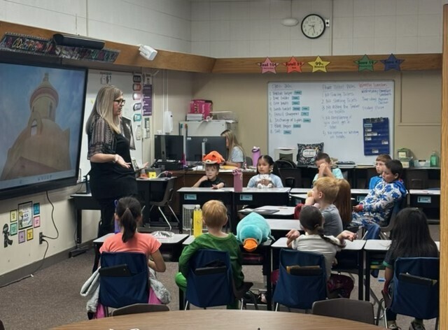 Mrs. Bliss reading to a class