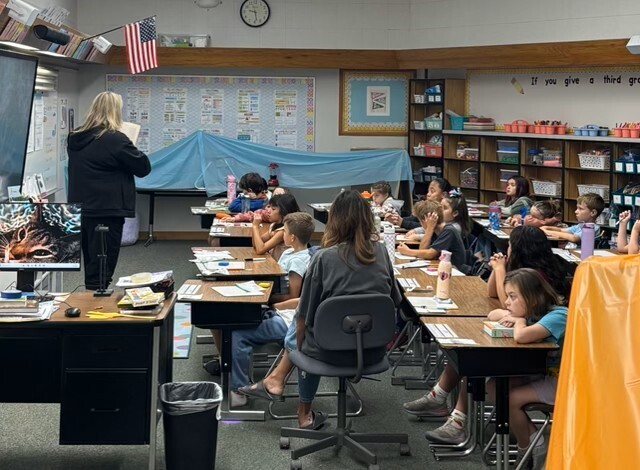 Ms. Yamashita reading