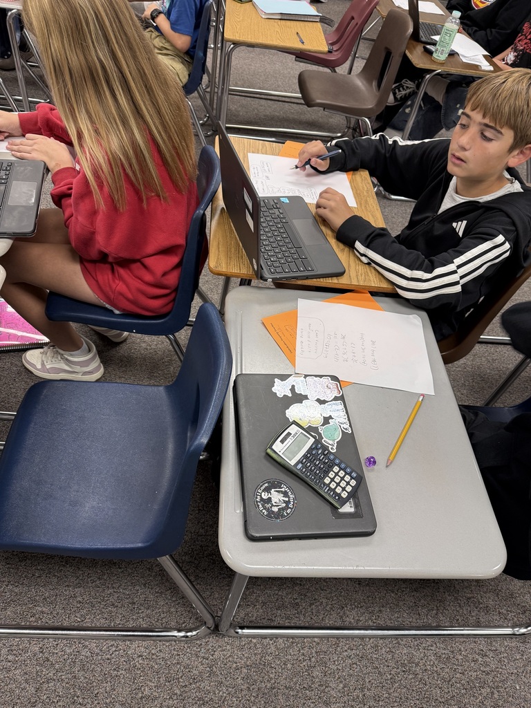 Photos of dice activity in math class. Today we used dice to create random distribution problems that each group needed to solve.