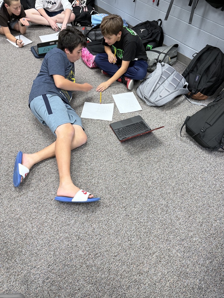 Photos of dice activity in math class. Today we used dice to create random distribution problems that each group needed to solve.