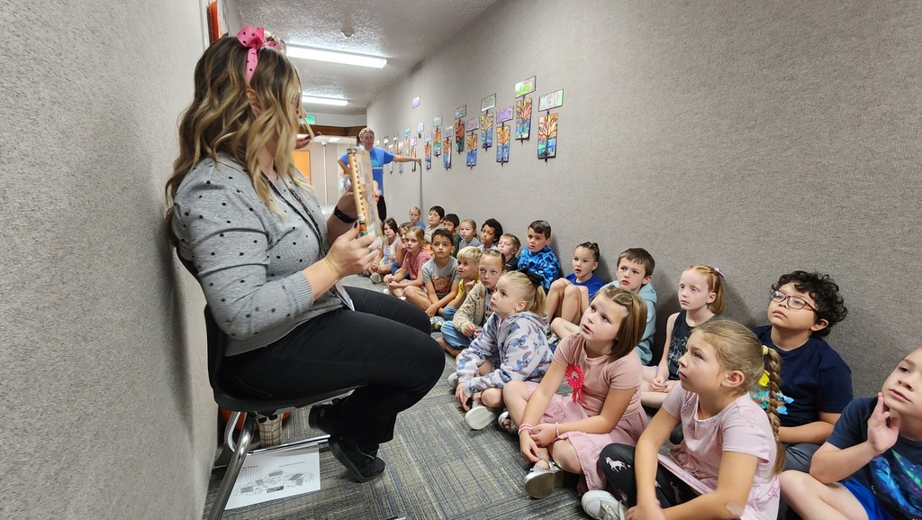 Teacher reading to students
