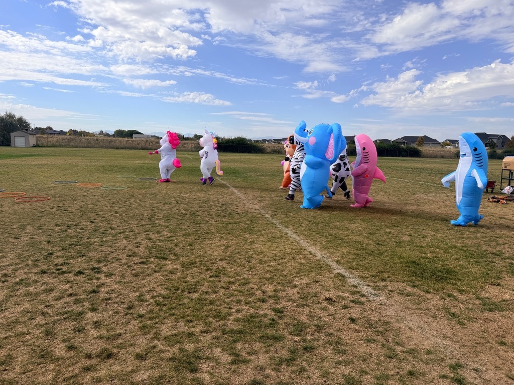 Teachers in inflatable suits