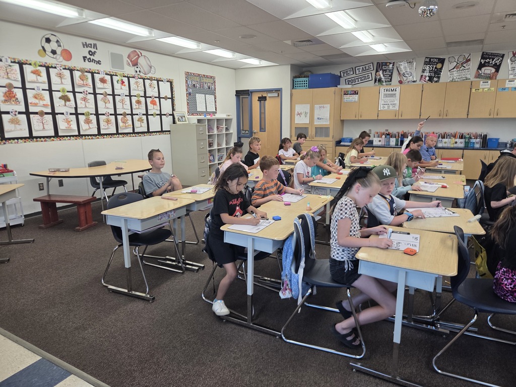 students sitting in desks working