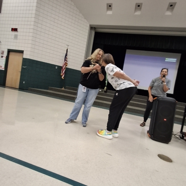 Mrs. Jacobsen kissing a rat