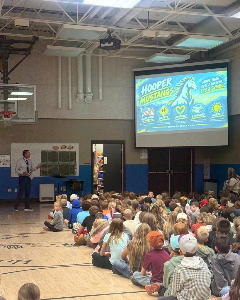 Photos from a school assembly at Hooper Elementary where students learned what it means to be a Mustang by showing grit, growth, and kindness. Additional photos feature a large Mustang mascot display that will be showcased at the front of the school.