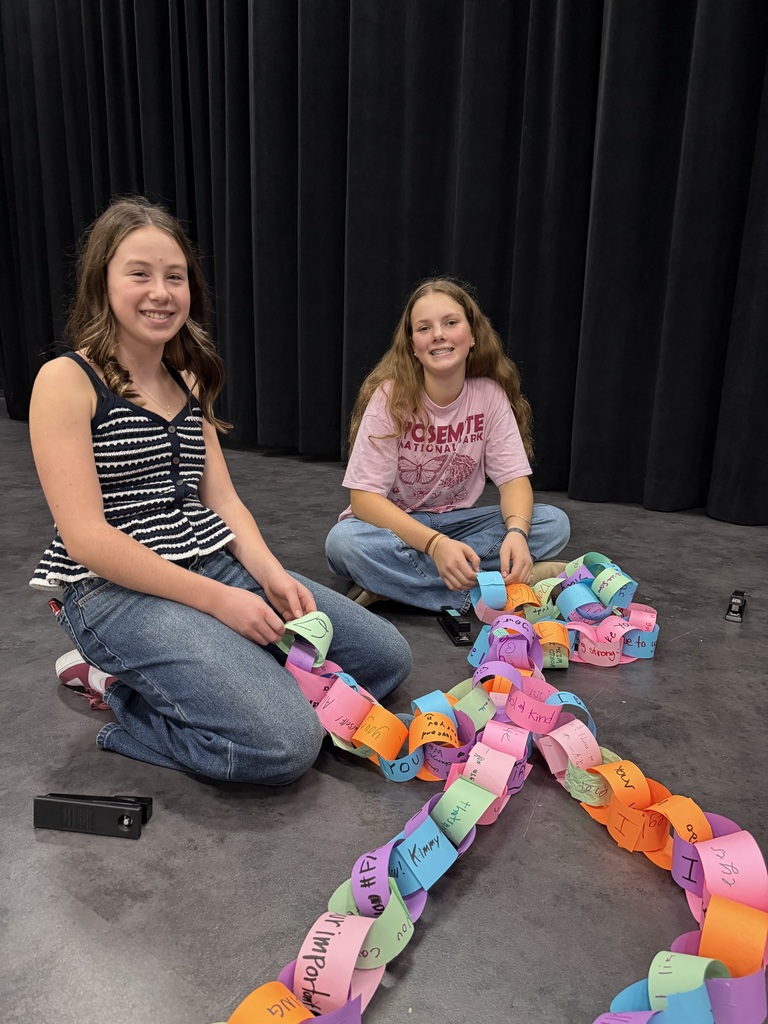 two girls smiling