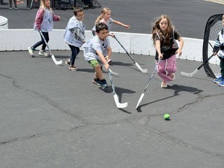 Action shot of Burch Creek Barracudas participating in the Tusky Takeover Field Day Event!