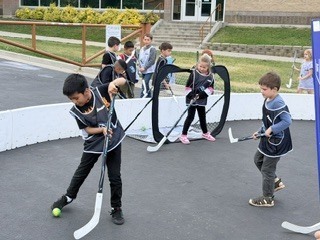 Action shot of Burch Creek Barracudas participating in the Tusky Takeover Field Day Event!