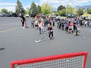 Action shot of Burch Creek Barracudas participating in the Tusky Takeover Field Day Event!