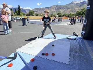 Action shot of Burch Creek Barracudas participating in the Tusky Takeover Field Day Event!