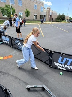 Action shot of Burch Creek Barracudas participating in the Tusky Takeover Field Day Event!