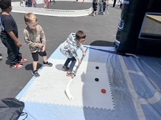 Action shot of Burch Creek Barracudas participating in the Tusky Takeover Field Day Event!