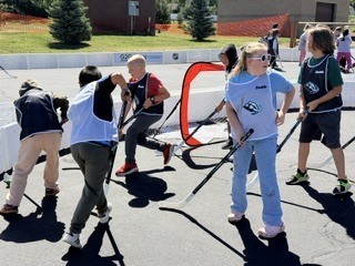 Action shot of Burch Creek Barracudas participating in the Tusky Takeover Field Day Event!