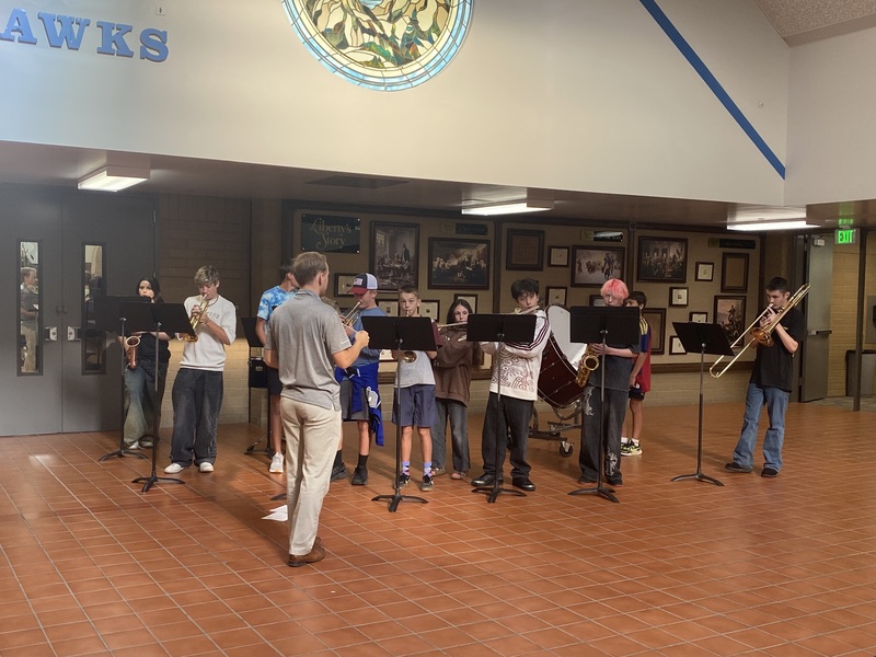 Snowcrest band warming up for the Welcome Assembly