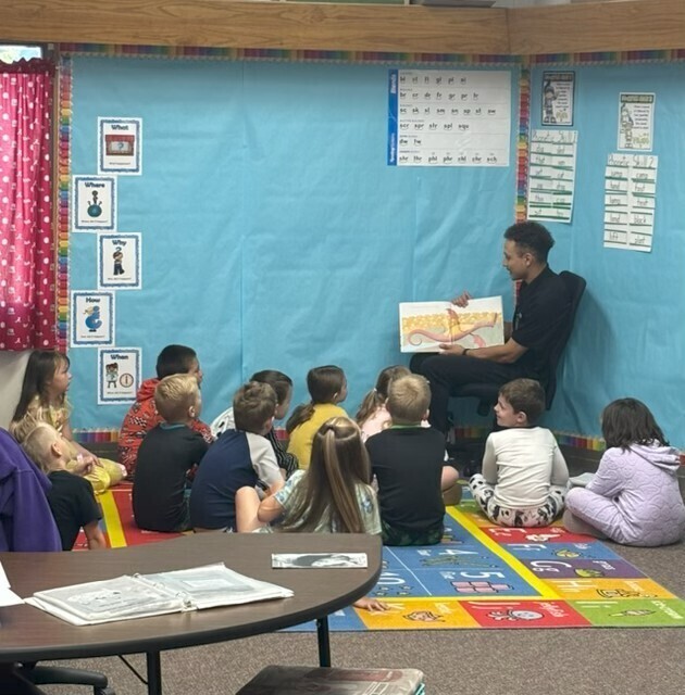 Mr. Zamarano reading to 2nd Grade