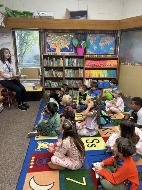 Mrs. Kindall reading to first graders