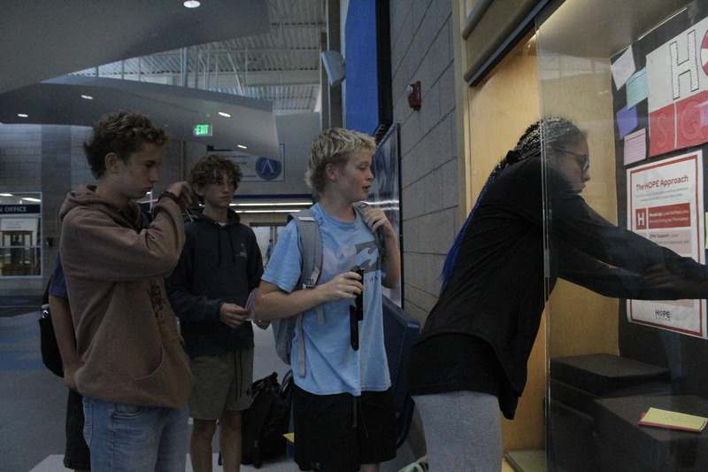 Students decorating Hope Squad Cabinet