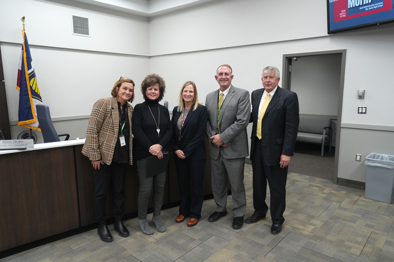 photograph at our board meeting of Matt Williams and Mrs. DiAne Morin receiving an award. 