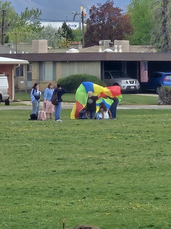 Photos of Roy Jr Students at the PBIS March Yourself to Class Reward Recess