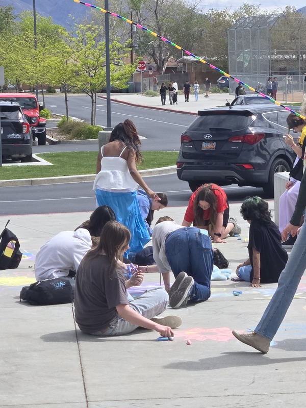 Photos of Roy Jr Students at the PBIS March Yourself to Class Reward Recess