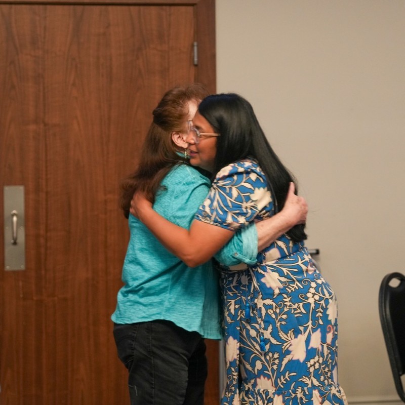 Award nominees hugging