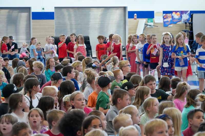 image of students performing in a program to celebrate the 250th anniversary of America