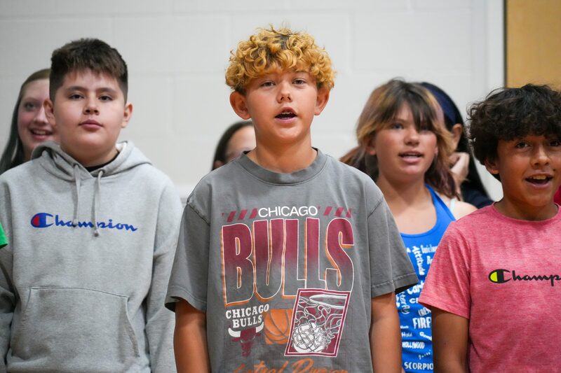 Students performing at Burch Creeks assembly to honor America's 250th Birthday