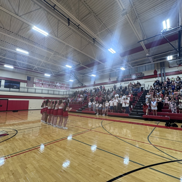 cheerleaders doing a cheer