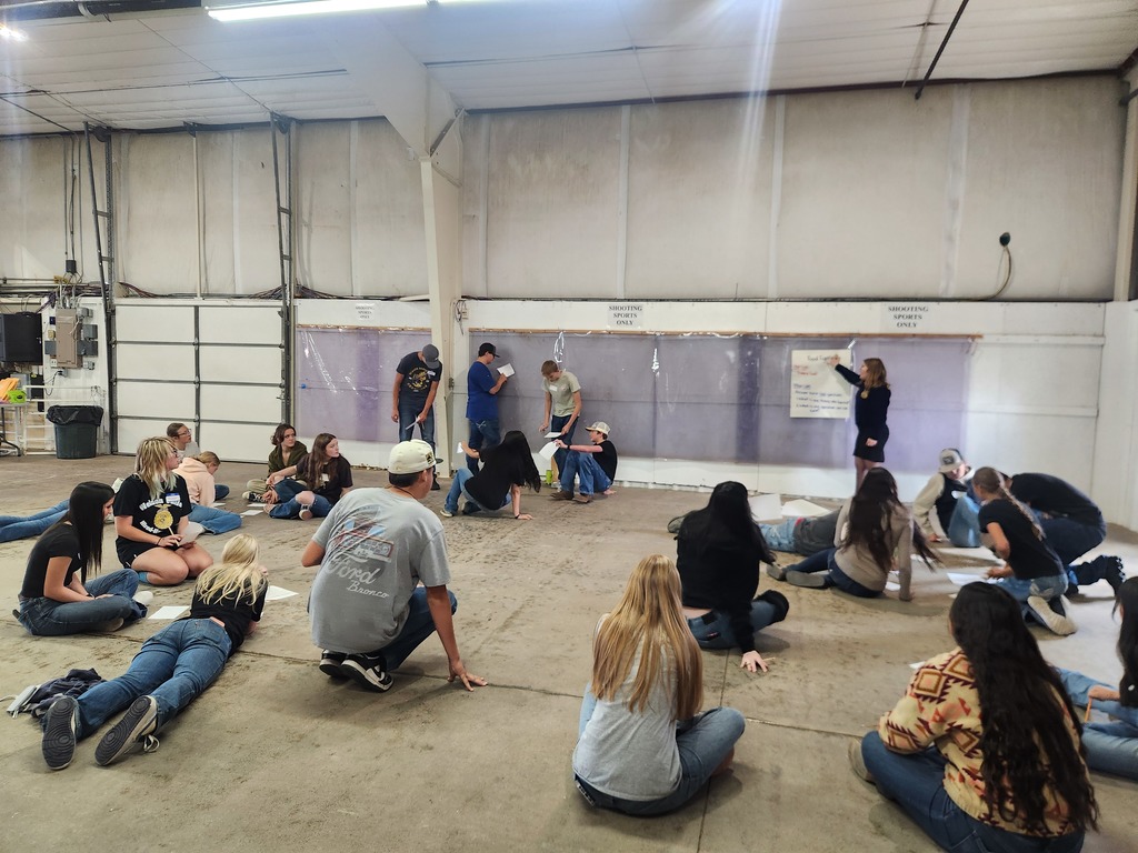 FFA members attending a workshop and listening to the speaker.