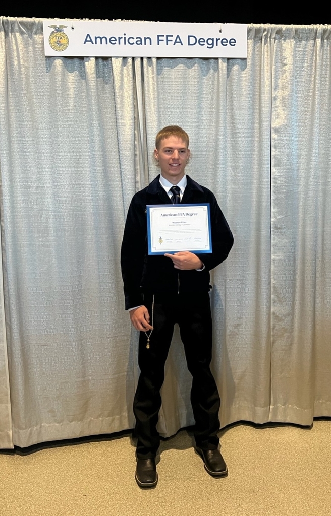 Westen Filter holding his American FFA Degree