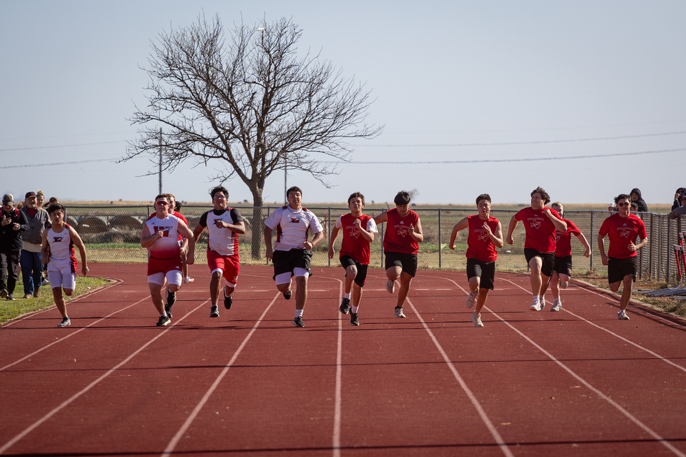 wellington high school line man run a 100 meter dash