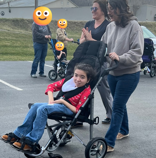 Student and mom lead the parade