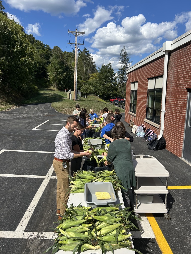 Students Husking Corn