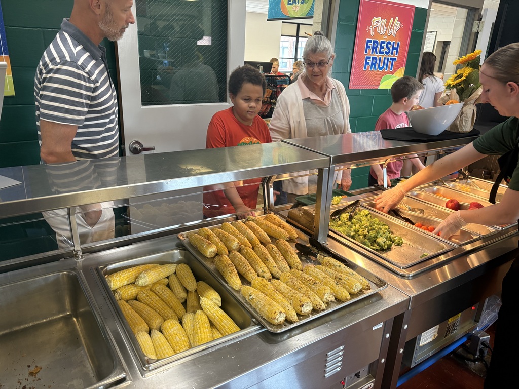 Lunch line serving corn