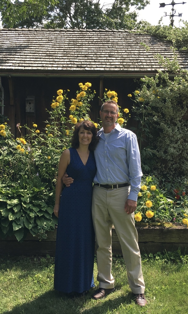 Dan Marple and his wife outside