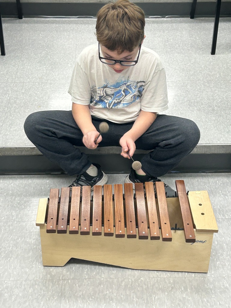 Student with xylophone