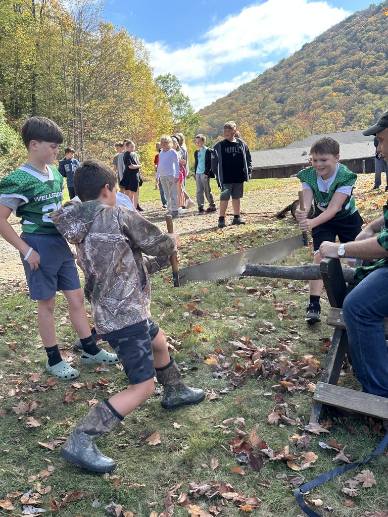 Students using cross saw