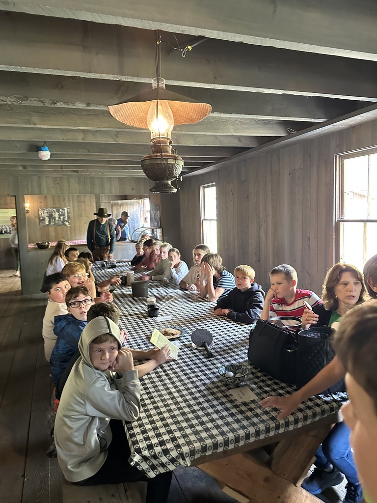 Students at table in old building