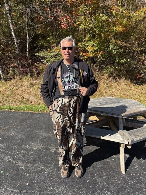 teacher outside with camo pants