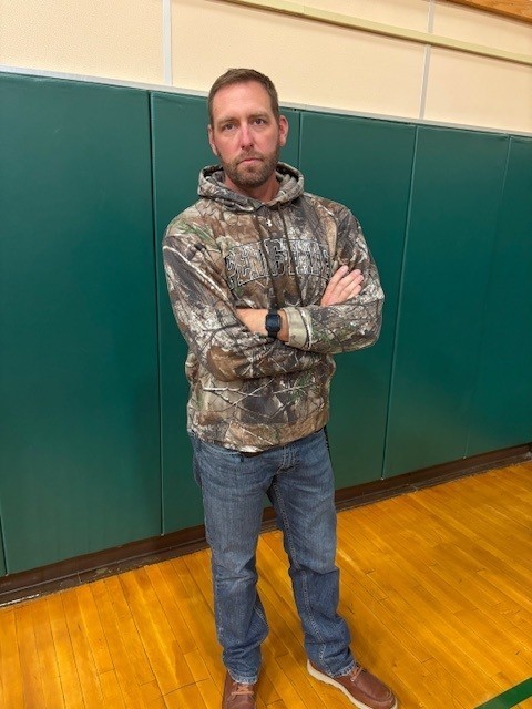 Grouchy looking teacher with camo