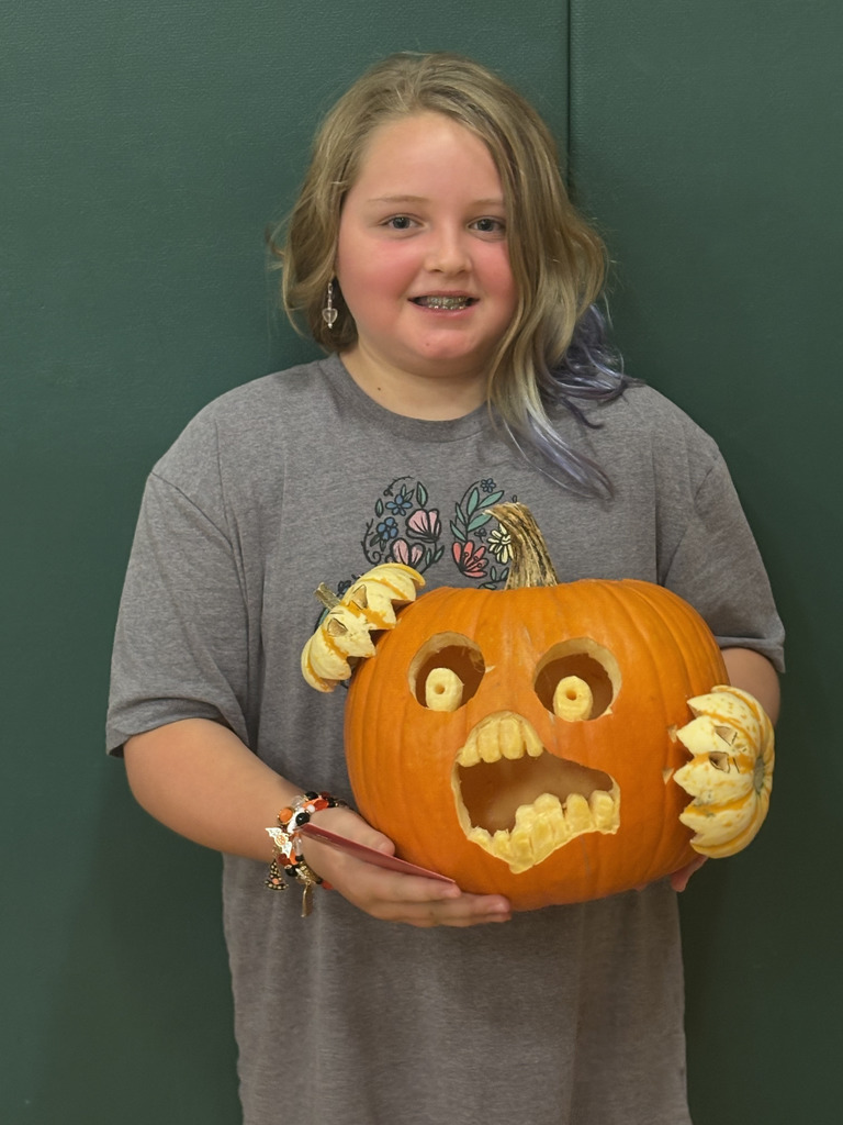 Student with pumpkin