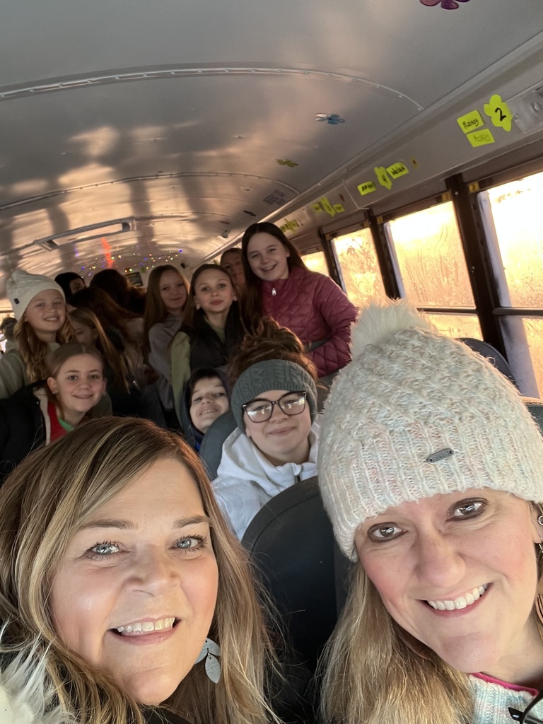 Students and drivers on bus