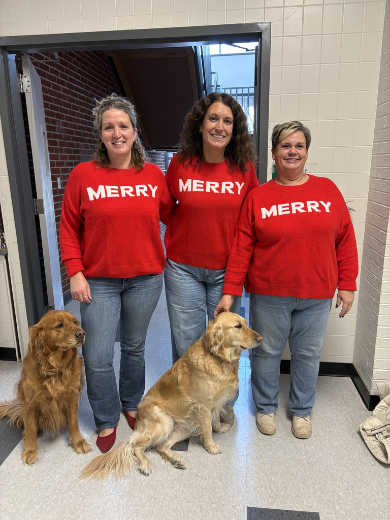teachers wearing merry sweaters