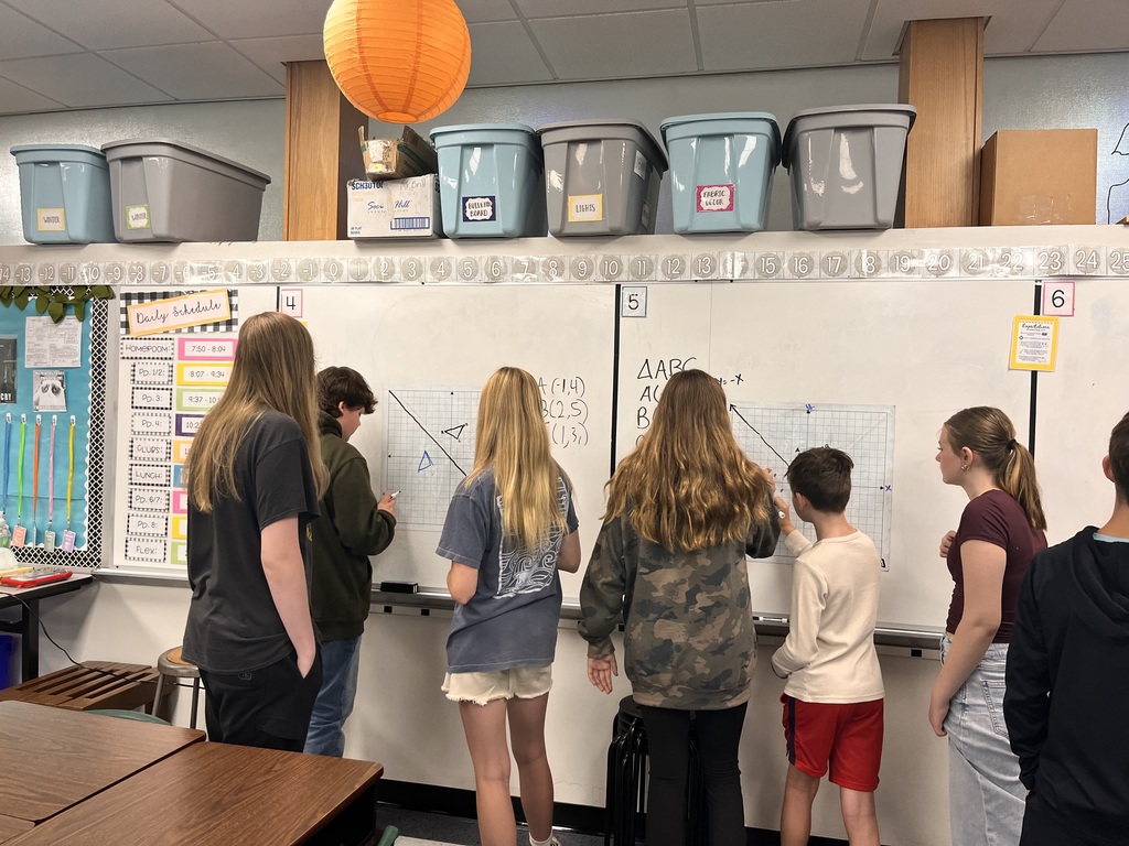 Students at white board