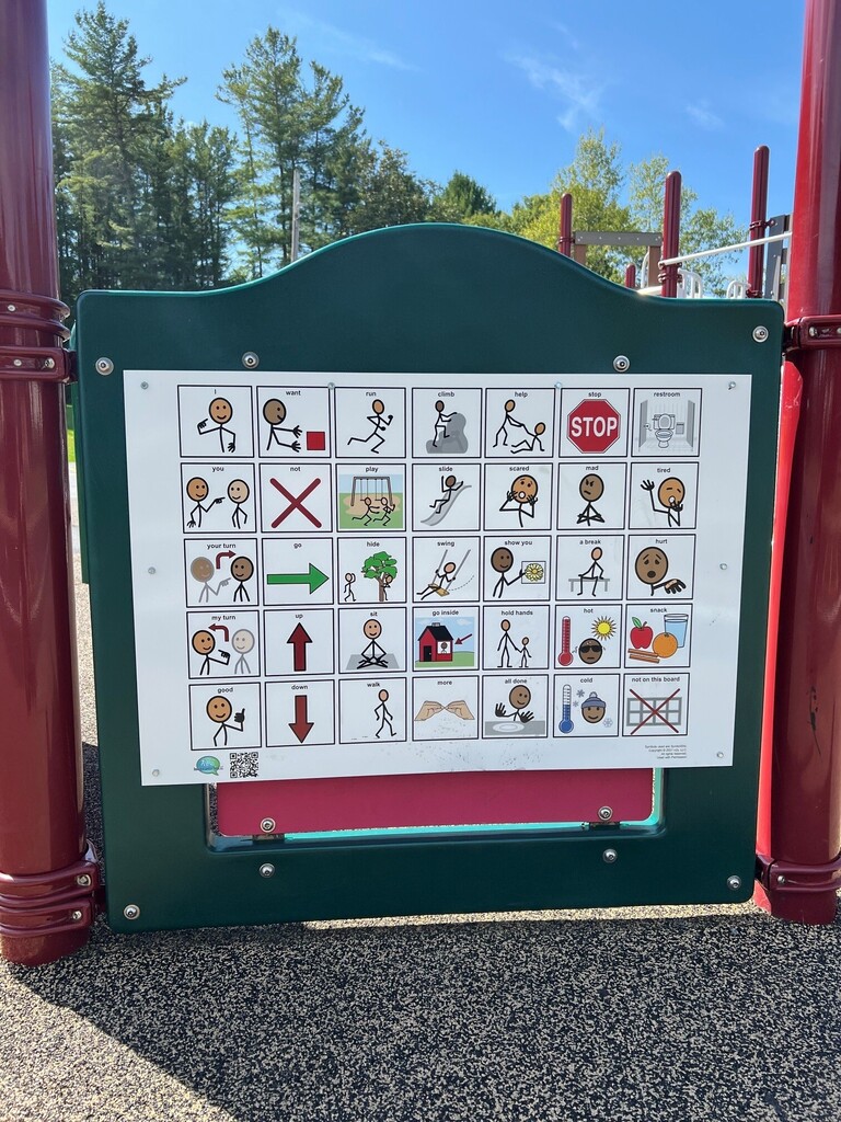 Close up photo of communication board affixed to Don Gill playground equipment