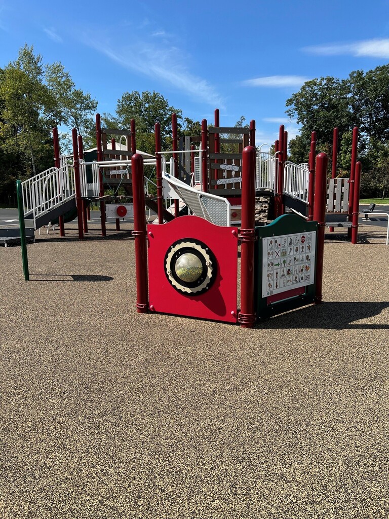 Communication board affixed to equipment on Don Gill playground