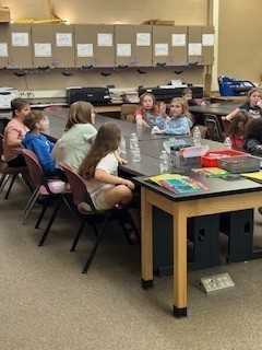 Students have a snack and have bat activities.